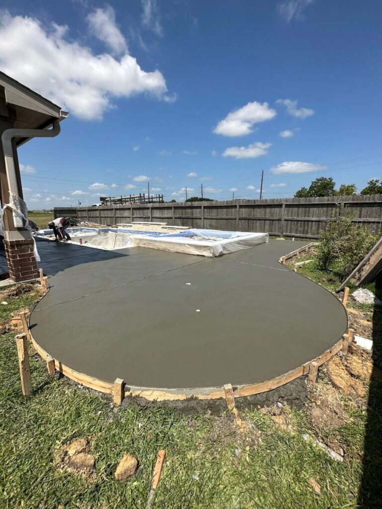 Mont Belvieu - Champions Gate - Geometric pool, raised spa, tanning ledge, water features - three scuppers and two bubblers, travertine coping, glass tile, pool table with travertine topper, raised backwall, spray decking, StoneScapes plaster