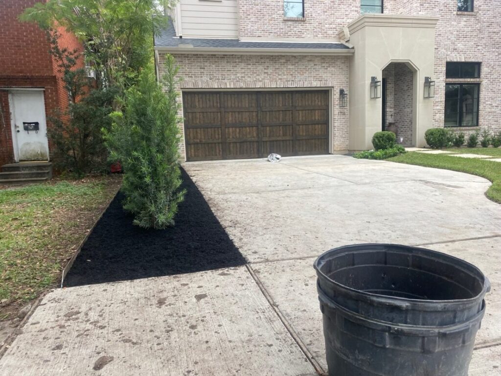 Heights Project Banks St - Poured-in-place concrete pavers, hardscaping, landscaping, Little Gem magnolia,, bamboo 'Graceful', Japanese yew, flax lily, black star gravel, white gravel, landscape uplights, Mexican heather, variegated liriope, sweet alyssum, metal planter, seasonal flowers, metal border built in-house, welded on-site, elegant white precast firepit
