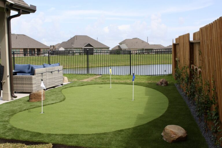 Texas Turf Tenders installed a geometric lap pool with a clean 6×6 tile finish. Spray decking offers a safe, polished surface, while a custom turf putting green adds a playful and personal touch.